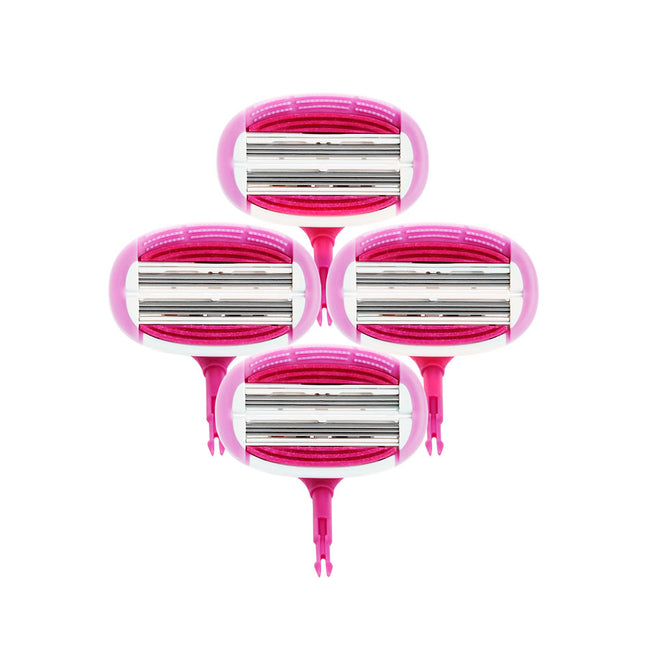 Four pink razors with silver blades on a white background