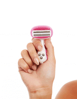 Woman taking off the blade cartridge head of a pink razor